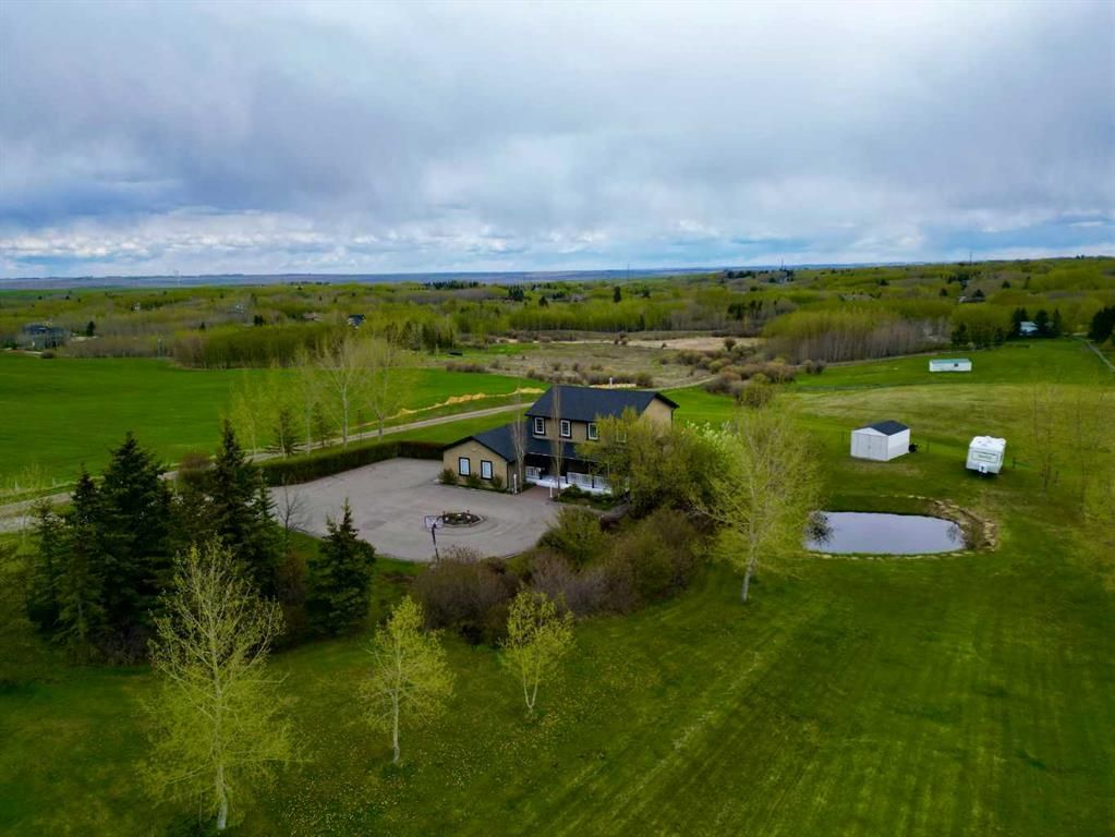 Main Photo: 260064 Bearspaw Road in Rural Rocky View County: Rural Rocky View MD Detached for sale : MLS®# A2113083