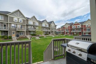Photo 11: 1109 125 Panatella Way NW in Calgary: Panorama Hills Row/Townhouse for sale : MLS®# A2134938