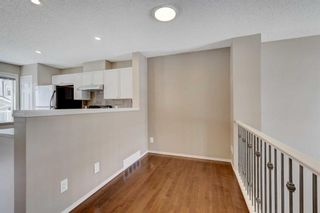 Photo 12: 790 Tuscany Drive NW in Calgary: Tuscany Row/Townhouse for sale : MLS®# A2109257