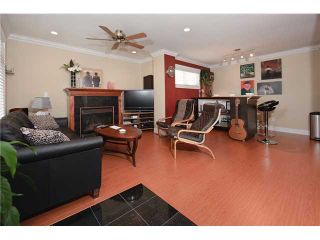 Photo 4: 1661 VICTORIA Drive in Vancouver: Grandview VE 1/2 Duplex for sale (Vancouver East)  : MLS®# V821460