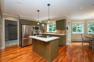 Photo 6: 5763 Grousewoods Crescent in North Vancouver: Grouse Woods House for sale : MLS®# R2695780