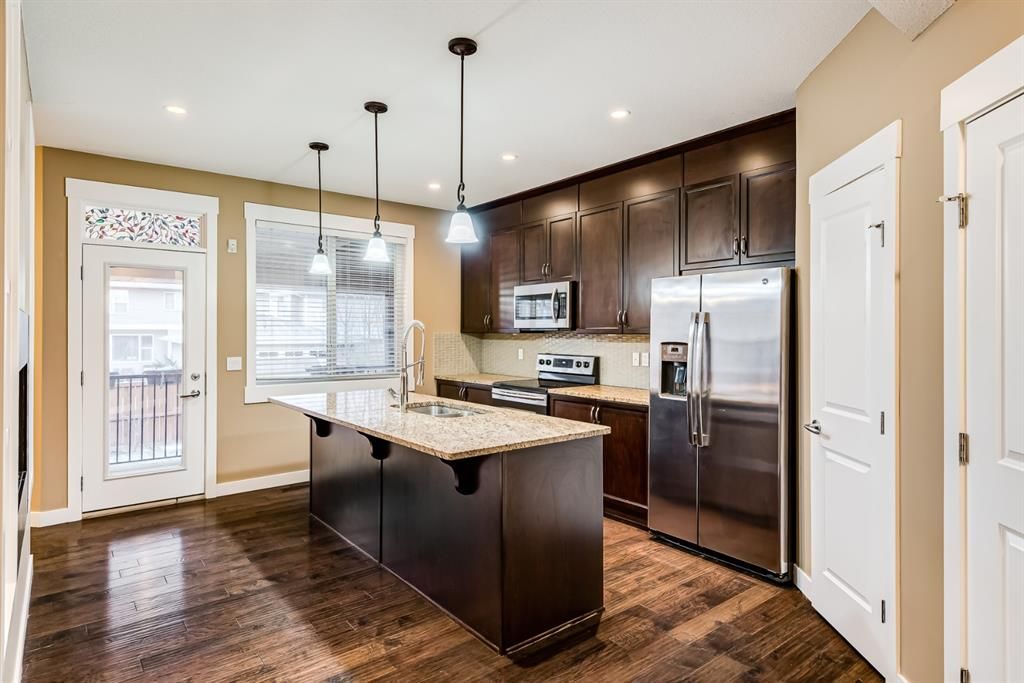 Photo 7: Photos: 228 Rainbow Falls Green: Chestermere Semi Detached for sale : MLS®# A1158715