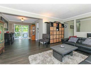 Photo 2: 818 ESSEX Avenue in Port Coquitlam: Lincoln Park PQ House for sale : MLS®# R2478115