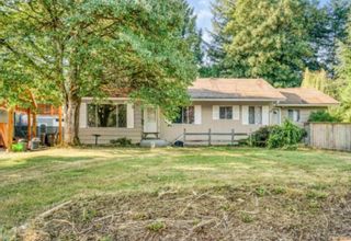 Photo 1: 20280 50 Avenue in Langley: Langley City House for sale : MLS®# R2865913