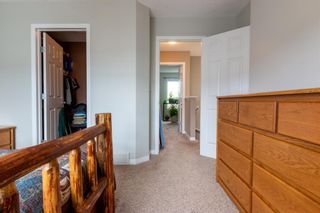 Photo 26: 113 Everhollow Heights SW in Calgary: Evergreen Row/Townhouse for sale : MLS®# A1215012