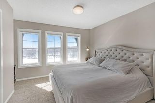 Photo 18: 107 Ascot Point SW in Calgary: Aspen Woods Row/Townhouse for sale : MLS®# A2033826