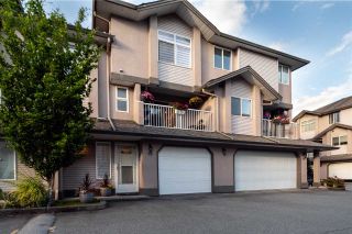 Photo 1: 30 2538 PITT RIVER Road in Port Coquitlam: Mary Hill Townhouse for sale in "River Court" : MLS®# R2590465