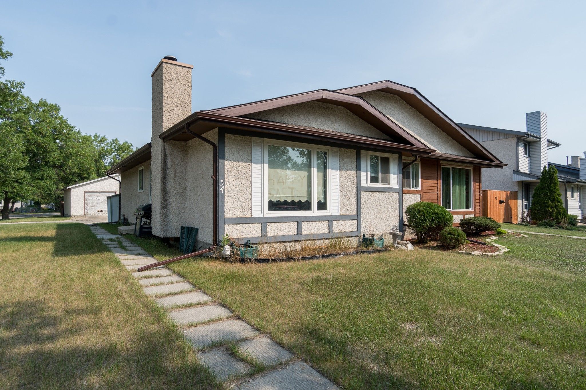 Photo 1: Photos: 34 Sanford Fleming in : Transcona Single Family Attached for sale (3K) 