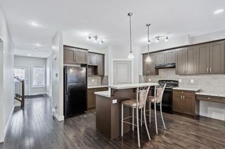 Photo 9: 4803 4 Street NW in Calgary: Highwood Semi Detached (Half Duplex) for sale : MLS®# A2010911