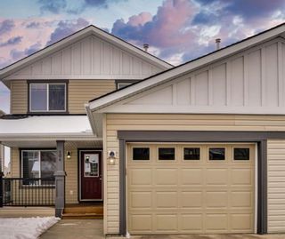 Photo 1: 104 2384 Sagewood Gate SW: Airdrie Row/Townhouse for sale : MLS®# A2107088