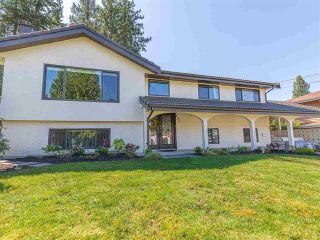 Photo 1: 890 Runnymede Ave in Coquitlam: Coquitlam West House for sale : MLS®# R2567229