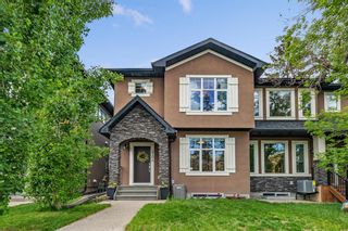 Main Photo: 3704 Richmond Road SW in Calgary: Killarney/Glengarry Semi Detached (Half Duplex) for sale : MLS®# A2053898