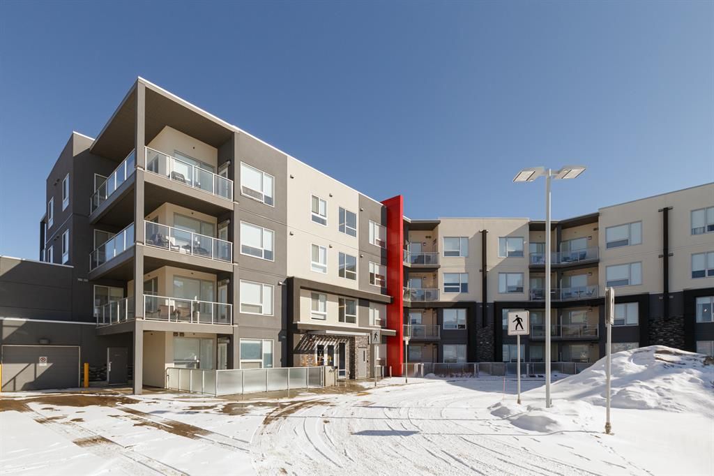 Main Photo: 318 8530 8A Avenue SW in Calgary: West Springs Apartment for sale : MLS®# A2032245