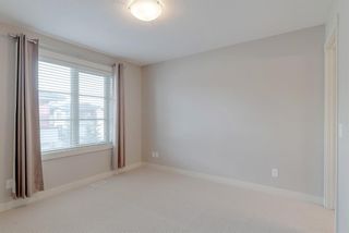 Photo 23: 18 Aspen Hills Common SW in Calgary: Aspen Woods Row/Townhouse for sale : MLS®# A1195955