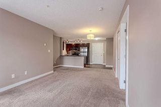 Photo 6: 211 403 Mackenzie Way SW: Airdrie Apartment for sale : MLS®# A2125740