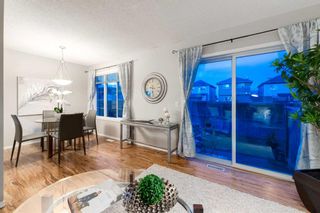 Photo 1: 93 Eversyde Point SW in Calgary: Evergreen Row/Townhouse for sale : MLS®# A2096827