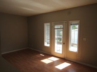 Photo 7: 9201 Morinville Drive in Morinville: Townhouse for rent