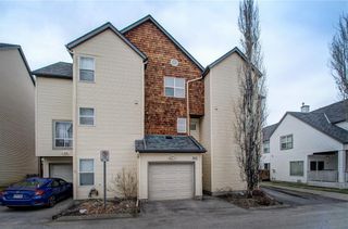 Photo 2: 312 BRIDLEWOOD Lane SW in Calgary: Bridlewood Row/Townhouse for sale : MLS®# A1046866