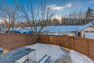 Photo 3: 61 Aspen Hills Drive SW in Calgary: Aspen Woods Row/Townhouse for sale : MLS®# A2103652