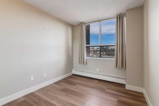 Photo 19: 701 145 Point Drive NW in Calgary: Point McKay Apartment for sale : MLS®# A2114173