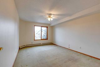 Photo 12: 426 7229 Sierra Morena Boulevard SW in Calgary: Signal Hill Apartment for sale : MLS®# A2096225
