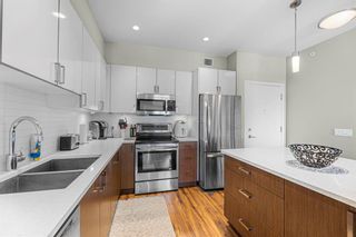 Photo 7: 410 16 Auburn Bay Link SE in Calgary: Auburn Bay Apartment for sale : MLS®# A2043597