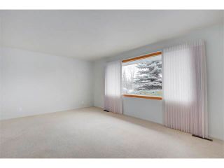 Photo 6: 3039 CANMORE Road NW in Calgary: Banff Trail House for sale