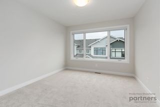 Photo 21: 948 Crestridge Common SW in Calgary: Crestmont Row/Townhouse for sale : MLS®# A2012906
