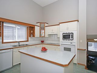 Photo 4: 1103 THORBURN Drive SE: Airdrie House for sale