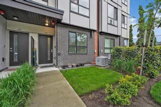 Photo 1: 8 19790 55A Avenue in Langley: Langley City Townhouse for sale in "TERRACE 2" : MLS®# R2603419