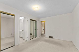 Photo 9: 743 Coach Bluff Crescent SW in Calgary: Coach Hill Detached for sale : MLS®# A2083358