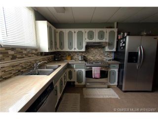 Photo 10: 1320 Horning Avenue in Kelowna: North Rutland House for sale : MLS®# 10102497