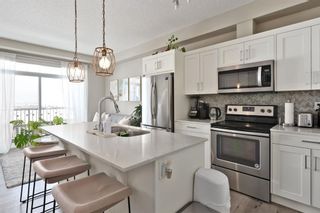 Main Photo: 408 100 Auburn Meadows Common SE in Calgary: Auburn Bay Apartment for sale : MLS®# A2117356