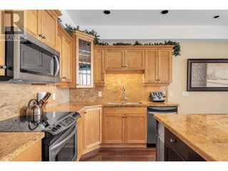 Photo 6: 7700 Porcupine Road Unit# 209 in Big White: House for sale : MLS®# 10304197
