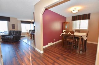 Photo 4: 784 LUXSTONE Landing SW: Airdrie House for sale : MLS®# C4160594