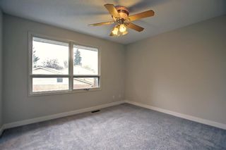 Photo 15: 77 123 Queensland Drive SE in Calgary: Queensland Row/Townhouse for sale : MLS®# A1145434