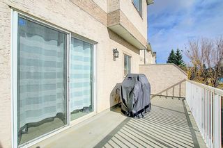 Photo 9: 121 Country Hills Gardens NW in Calgary: Country Hills Row/Townhouse for sale : MLS®# A1057496