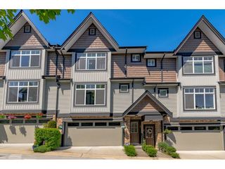Photo 1: 63 6299 144 Street in Surrey: Sullivan Station Townhouse for sale in "Altura" : MLS®# R2482013