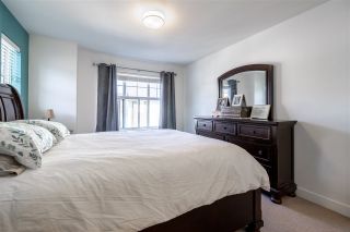 Photo 18: 74 27735 ROUNDHOUSE Drive in Abbotsford: Aberdeen Townhouse for sale in "Roundhouse" : MLS®# R2485812