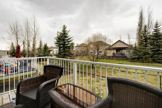 Photo 24: 10 Crystal Shores Cove: Okotoks Row/Townhouse for sale : MLS®# A1217849