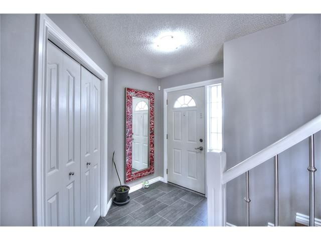 Photo 10: Photos: 16214 EVERSTONE Road SW in Calgary: Evergreen House for sale : MLS®# C4057405