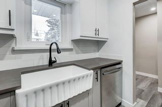 Photo 12: 4403 Bow Trail SW in Calgary: Rosscarrock Row/Townhouse for sale : MLS®# A2022311