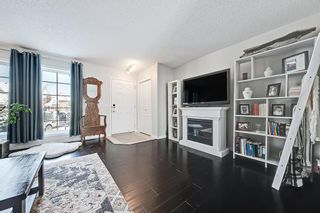 Photo 3: 58 Auburn Crest Place SE in Calgary: Auburn Bay Semi Detached (Half Duplex) for sale : MLS®# A2030014