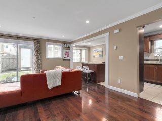 Photo 2: 8445 FREMLIN Street in Vancouver: Marpole 1/2 Duplex for sale in "MARPOLE" (Vancouver West)  : MLS®# R2135044