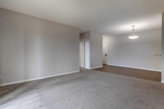Photo 12: 316 2022 Canyon Meadows Drive SE in Calgary: Queensland Apartment for sale : MLS®# A2059840