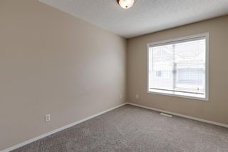 Photo 18: 208 Toscana Gardens NW in Calgary: Tuscany Row/Townhouse for sale : MLS®# A1127708