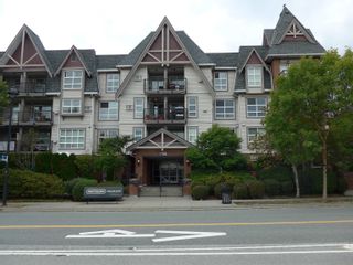 Photo 1: 410 17769 57 AVE Avenue in Surrey: Cloverdale BC Condo for sale in "clover downs estates" (Cloverdale)  : MLS®# R2812315