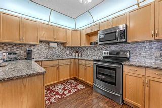 Photo 10: 240 6868 Sierra Morena Boulevard SW in Calgary: Signal Hill Apartment for sale : MLS®# A2127784