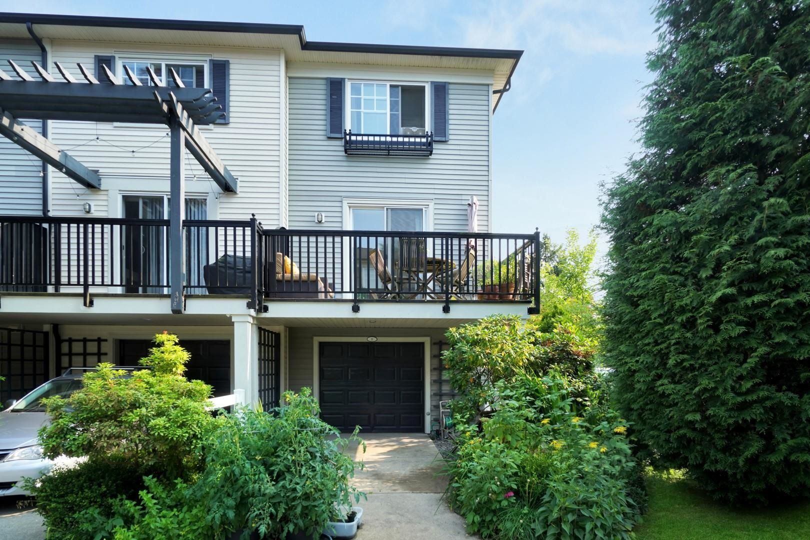 Main Photo: 11 2495 DAVIES Avenue in Port Coquitlam: Central Pt Coquitlam Townhouse for sale in "Arbour" : MLS®# R2794486