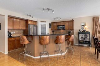 Photo 8: 200 Cougartown Close SW in Calgary: Cougar Ridge Detached for sale : MLS®# A2124049